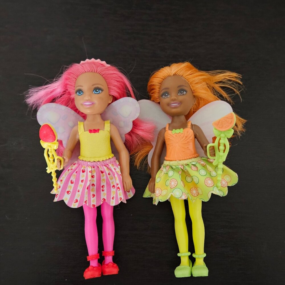 Two Barbie Fairy dolls